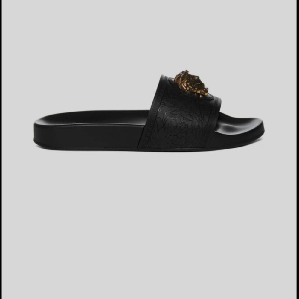 Brand new with tags Versace black slides